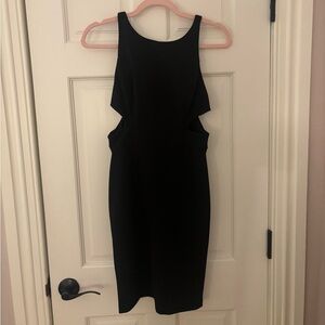 Black cocktail dress with cut outs